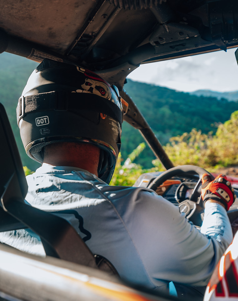 Driver's view from inside a UTV climbing mountain trails in Haiti
